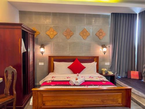 Una cama o camas en una habitación de The Palmery