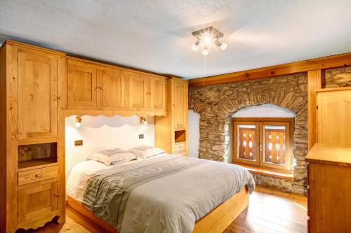 Ένα ή περισσότερα κρεβάτια σε δωμάτιο στο Chalet vista Monte Bianco