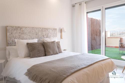 Posteľ alebo postele v izbe v ubytovaní Living4malaga Blue Bay