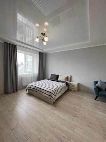 En eller flere senge i et værelse på Belveder Center Home