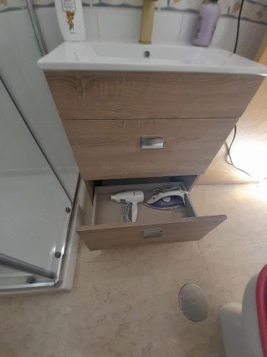 a bathroom with a sink and a counter at Benidorm Center Centro in Benidorm