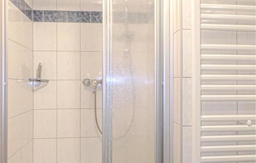 a shower with a glass door in a bathroom at Amazing Apartment In Rauris With 1 Bedrooms in Rauris