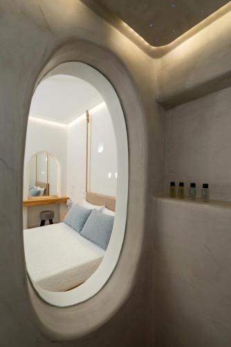 Postel nebo postele na pokoji v ubytování Hotel Thira
