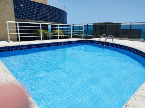 a large swimming pool on top of a building at Ocean Atlantic Praia de Iracema in Fortaleza