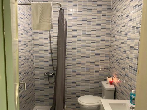 a bathroom with a shower with a toilet and a sink at Oporto2All Apartments - Apt4 in Vila Nova de Gaia