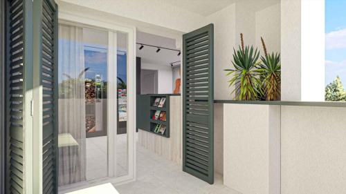 a rendering of a house with plants on the wall at Malinska Green Apartments in Malinska