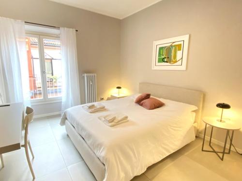 En eller flere senge i et værelse på Dimora Castelmaraldo
