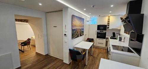 Foto The Modern Cave Lodge - ComfyHome Apartments Stuttgart 4