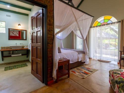 Voodi või voodid majutusasutuse The Courtney Lodge toas