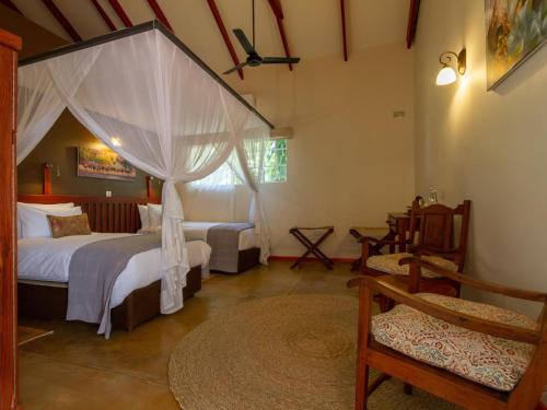 Voodi või voodid majutusasutuse The Courtney Lodge toas