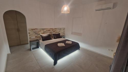 Katil atau katil-katil dalam bilik di Mykonian Tramonti Villas