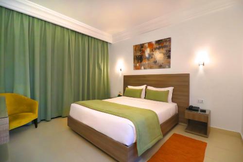 El Oumara Hotelにあるベッド