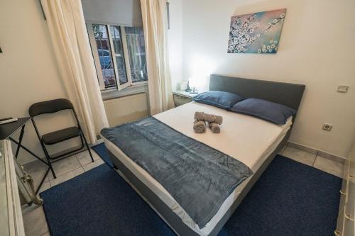 Кровать или кровати в номере Marina Apartment