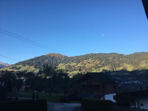 a view of a mountain with hills in the background at Ferienwohnung Thresi Leo in Hart im Zillertal