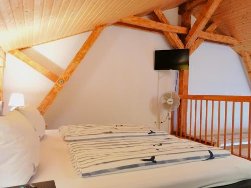 Postel nebo postele na pokoji v ubytování Hof am Meer "Seemöwe"