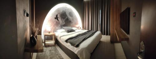 Кровать или кровати в номере Star Room