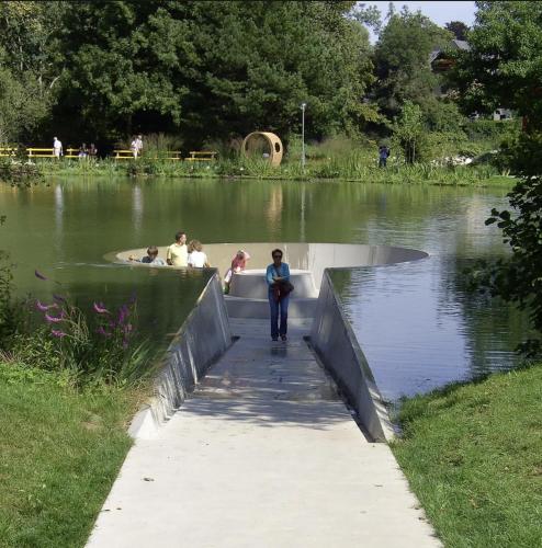 a group of people in a boat in a lake at Gästehaus am Stadtpark in Vöcklabruck