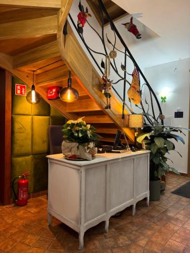 an office with a desk under a staircase at Villa Admiral in Gdynia