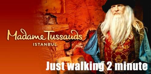 a picture of a man with a white beard and a sign at Hotel Gritti Pera & Spa in Istanbul