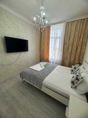 Krevet ili kreveti u jedinici u okviru objekta Двухкомнатная квартира в жилом доме ЖК Арман/ One-bedroom apartment in Arman residential complex