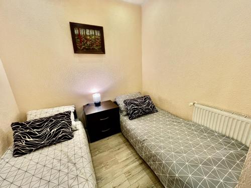 Postel nebo postele na pokoji v ubytování Apartament Karkonoska 19 Karpacz by Przycup w Karkonoszach Apartamenty Karpacz Centrum Karkonosze