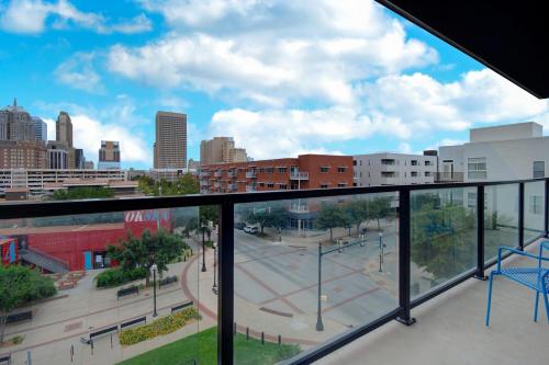 a view of a city from a balcony at Aloft Oklahoma City Downtown – Bricktown in Oklahoma City
