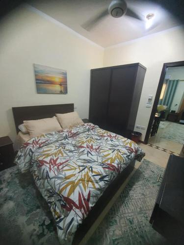 Ένα ή περισσότερα κρεβάτια σε δωμάτιο στο Abeer suites 2