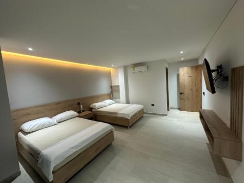 Postel nebo postele na pokoji v ubytování Hotel La Casona San Sebastian