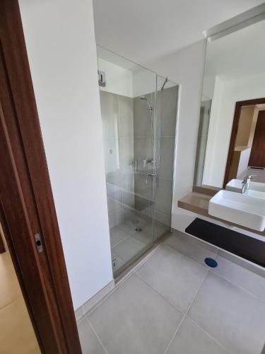 a bathroom with a shower and a sink at Lightoasis Oasis Mar 3 in Portimão