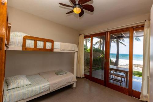 Ένα ή περισσότερα κρεβάτια σε δωμάτιο στο Casa Luz De Luna-MANCORA