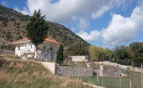 a house on the side of a hill at Mirto’s House 