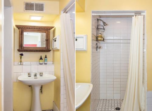 a bathroom with a sink and a shower at Chateau Tivoli Bed and Breakfast in San Francisco
