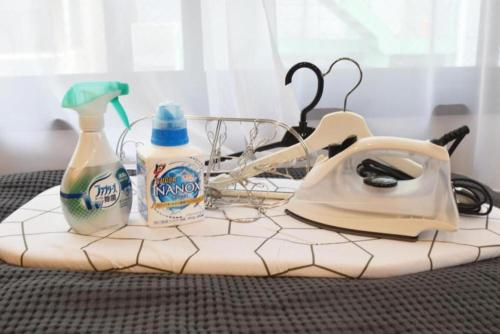a table with a telephone and a bottle of cleaner at Ethos Ebisu 201 - Vacation STAY 09298v in Tokyo