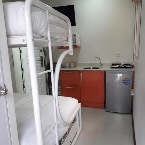 Η κουζίνα ή μικρή κουζίνα στο Elementz Apartments