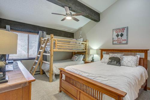 a bedroom with a bunk bed and a desk at Colorado Escape w/ Pool Access & Mountain Views! in Avon