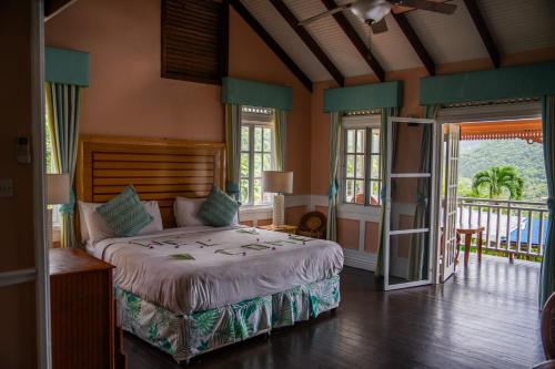 Ein Bett oder Betten in einem Zimmer der Unterkunft La Haut Resort