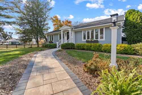 a house with a walkway in front of it at The Rest at Potomac Farms in Ashburn