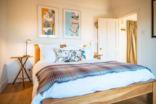 Ένα ή περισσότερα κρεβάτια σε δωμάτιο στο Kinkell Cottage