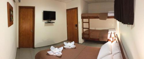 Ένα ή περισσότερα κρεβάτια σε δωμάτιο στο Hotel Ummagumma