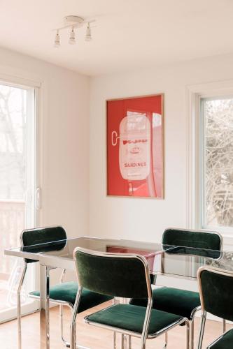 a room with chairs and a table and a picture at Town & Trail - Walkable Wellington Charmer in Wellington