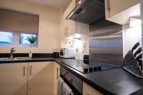 Η κουζίνα ή μικρή κουζίνα στο Cosy 2 Bedroom flat in Stevenage