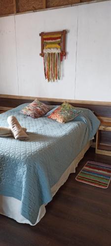 Lova arba lovos apgyvendinimo įstaigoje Cabañas La Cascada