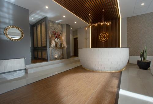 a lobby with a reception desk in a building at LAS BRISAS SUR in La Paz