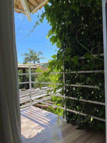 a view from the porch of a house at São Francisco do Sul, SC, Praia do Forte. in São Francisco do Sul