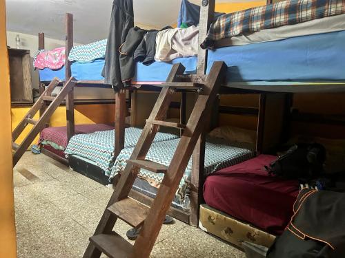 a group of bunk beds in a room at Esperanza Hostel in Antigua Guatemala