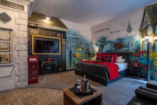 a room with a bed and a wall mural at The Anniversary Inn - Boise in Boise