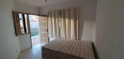 Postel nebo postele na pokoji v ubytování Casa Sol&Mar com Piscina na Beira da Praia Guriri