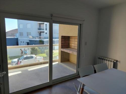 En eller flere senge i et værelse på Monte Hermoso del Este-Punta Tejada