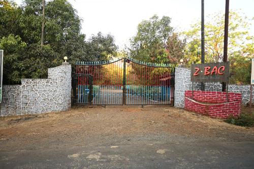 a gate with a zoo sign in front of it at Z-Bac Adventure & Leisure Resort Kolad in Kolād