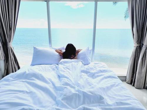 Katil atau katil-katil dalam bilik di TheSkyCozy Beachfront